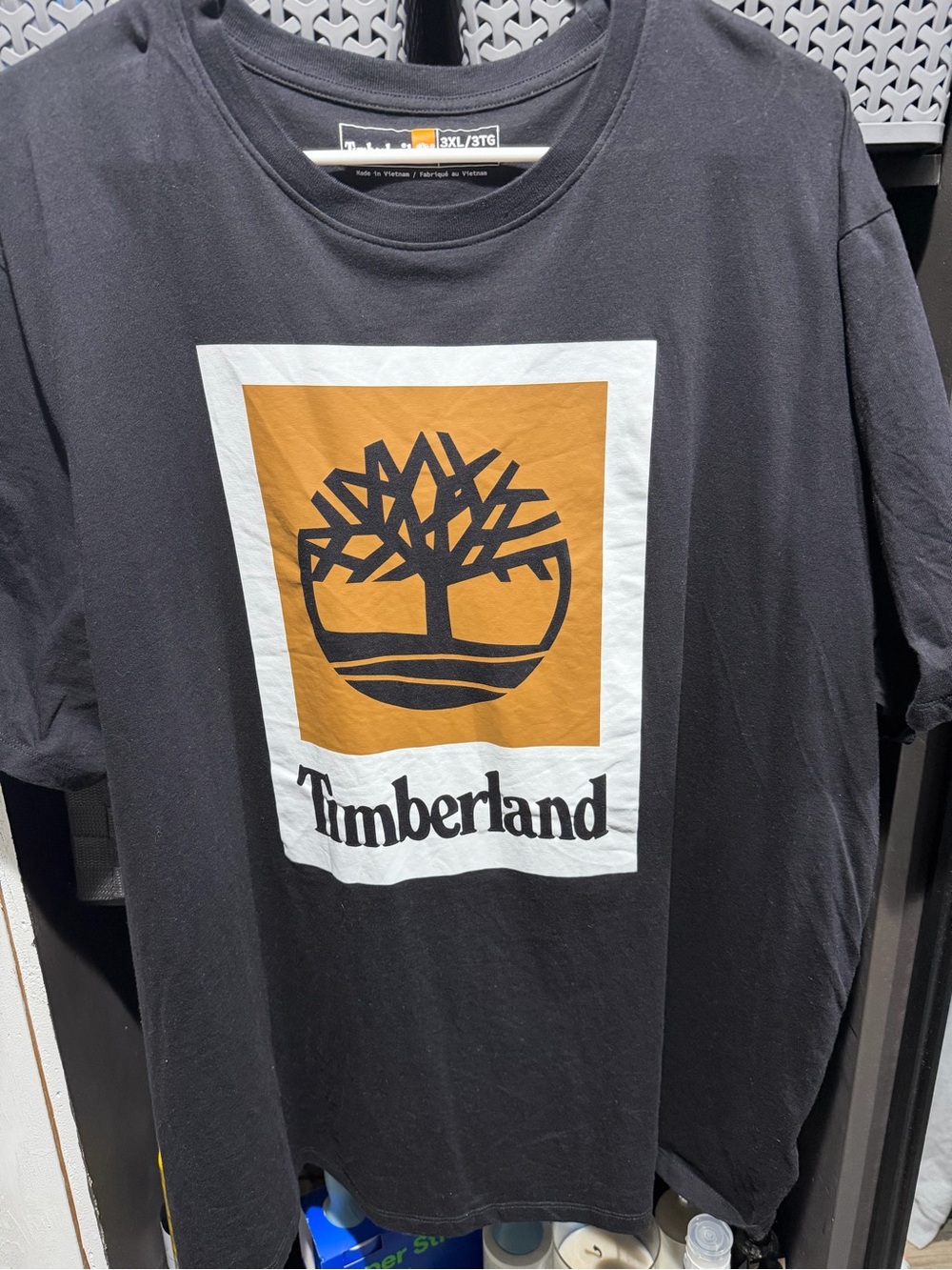 Timberland Black Short-Sleeve Tee with Gold Logo Panel